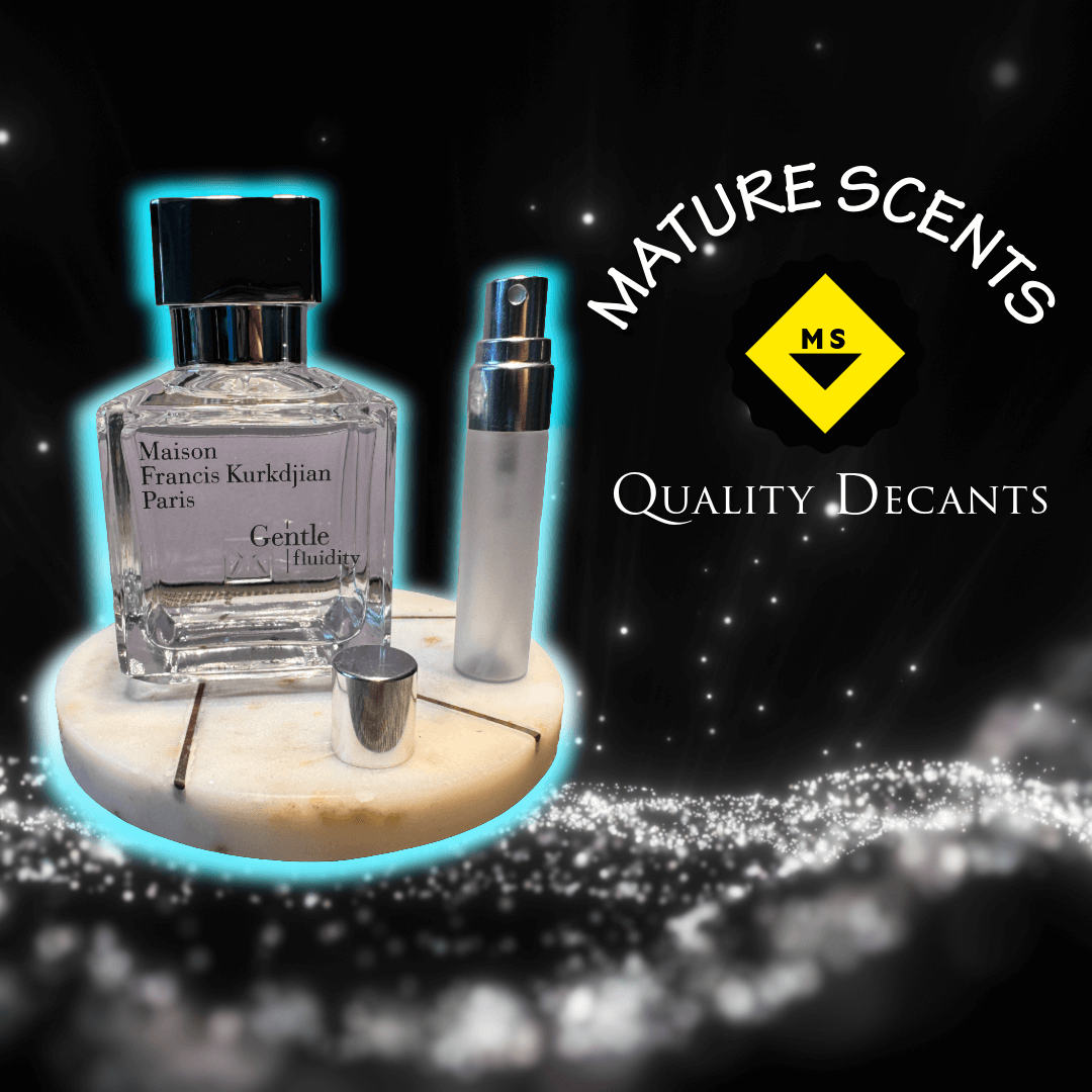 Perfume bottle labeled "Maison Francis Kurkdjian Paris Gentle fluidity" next to a decant and sample spray bottle  "Decants" text and starburst design.